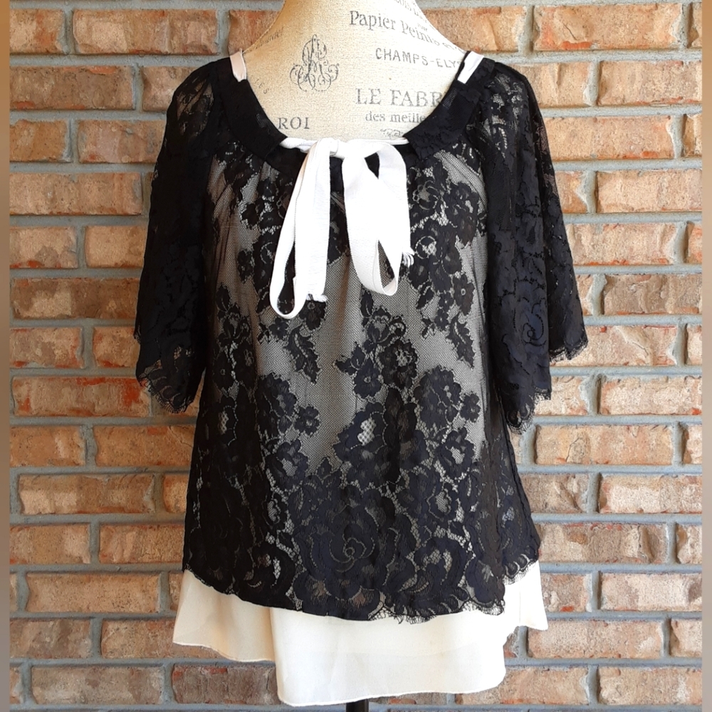 Karen Kane Short Sleeve Lace Overlay Blouse with Tie Detail.